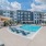 Resort-style saltwater pool with sundeck & poolside cabanas at Lyra by Radius